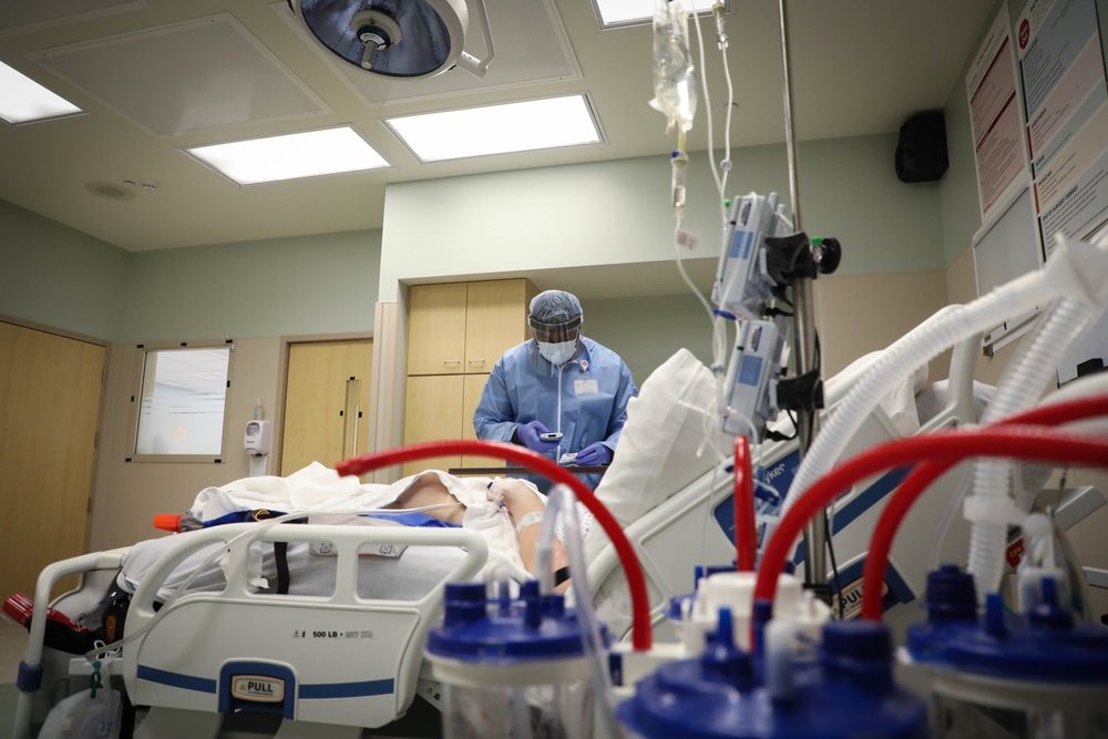 Nurses and techs from UAMTF-531 help with patient care at Marshfield Medical Center in Eau Claire, Wisconsin