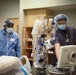 Nurses and techs from UAMTF-531 help with patient care at Marshfield Medical Center in Eau Claire, Wisconsin