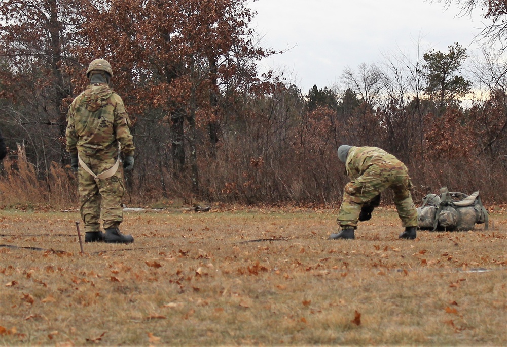 Cold-Weather Operations Course students practice building Arctic tent