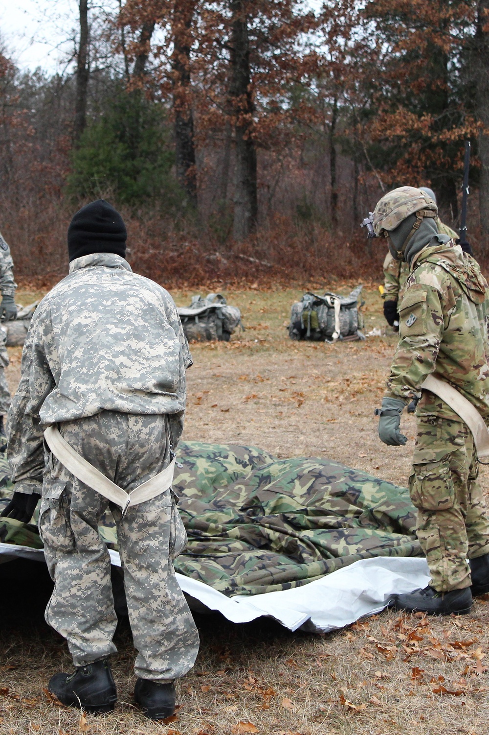 Cold-Weather Operations Course students practice building Arctic tent