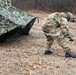 Cold-Weather Operations Course students practice building Arctic tent