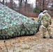 Cold-Weather Operations Course students practice building Arctic tent