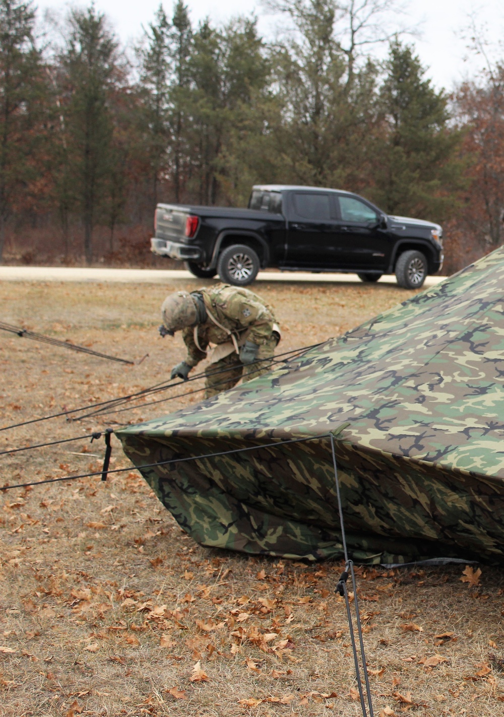 Cold-Weather Operations Course students practice building Arctic tent