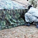 Cold-Weather Operations Course students practice building Arctic tent