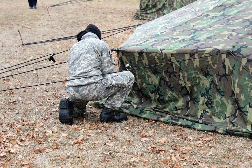 Cold-Weather Operations Course students practice building Arctic tent