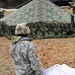 Cold-Weather Operations Course students practice building Arctic tent