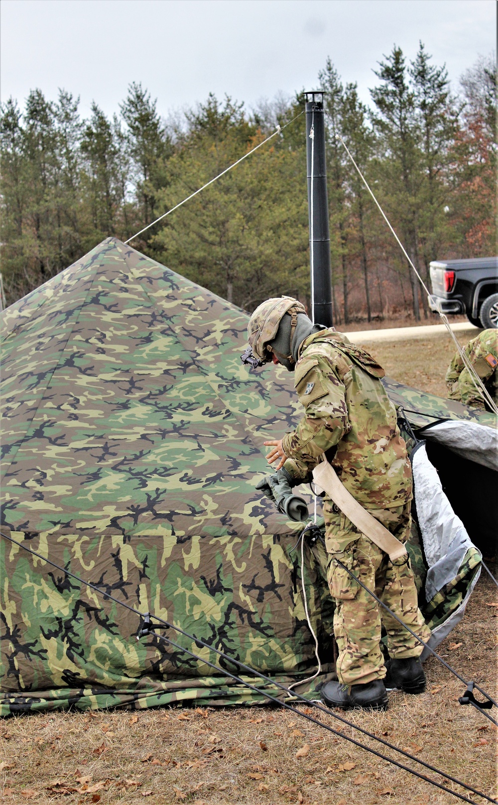 Cold-Weather Operations Course students practice building Arctic tent