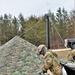 Cold-Weather Operations Course students practice building Arctic tent