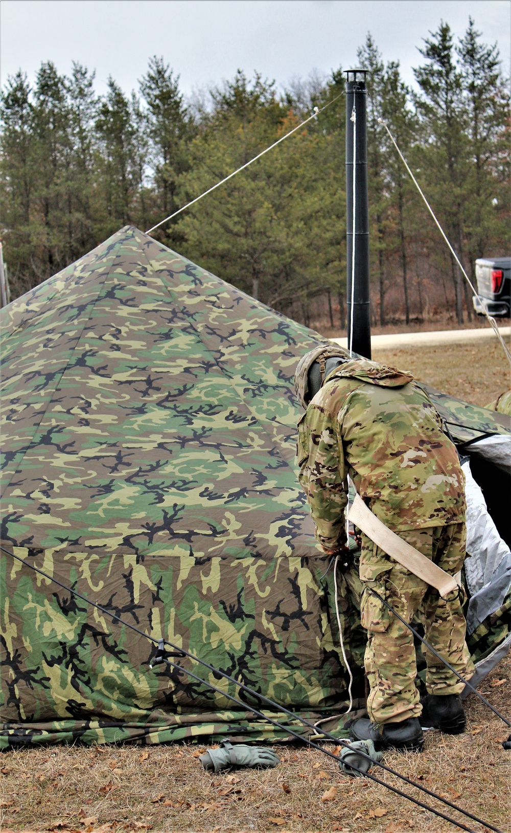 Cold-Weather Operations Course students practice building Arctic tent