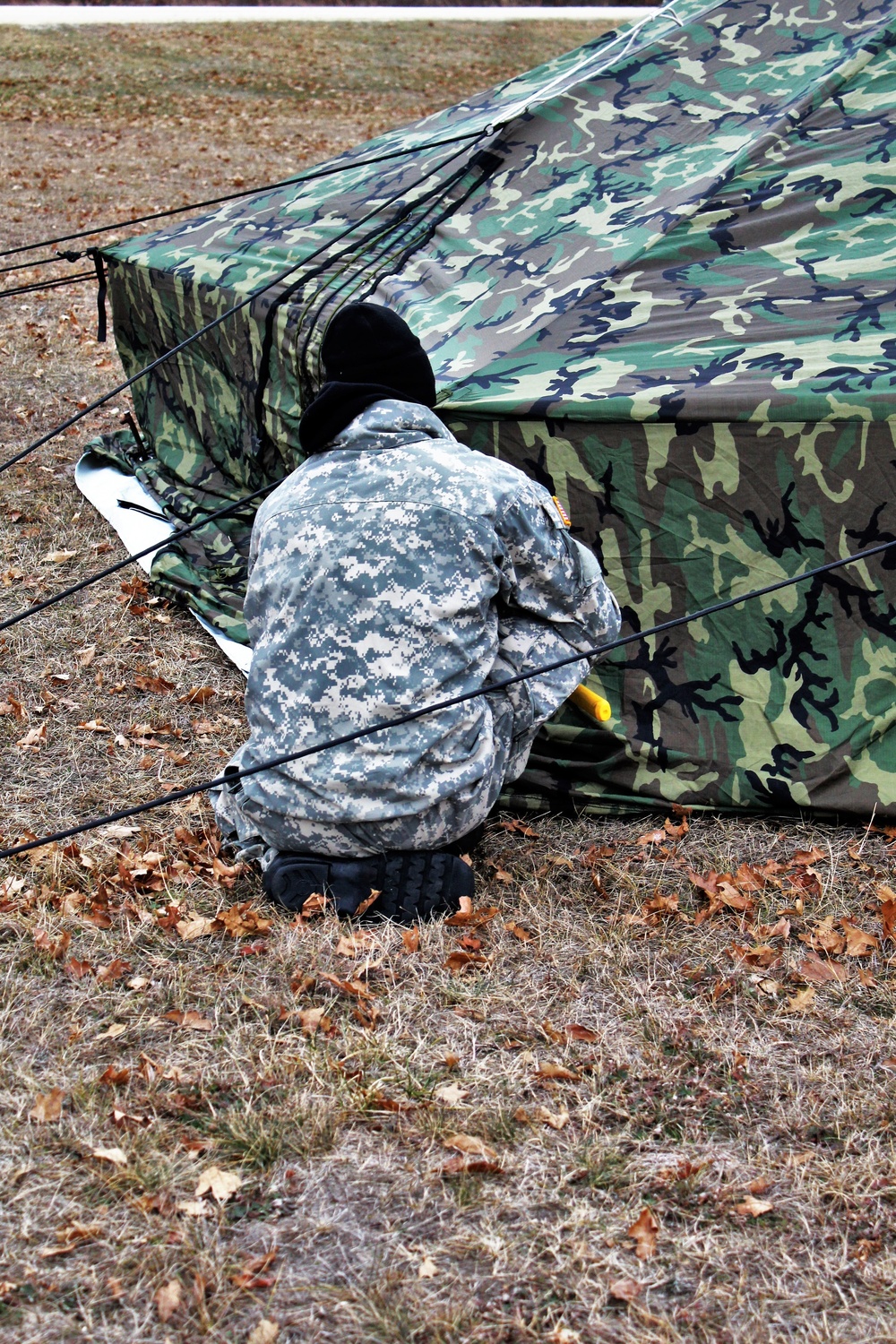 Cold-Weather Operations Course students practice building Arctic tent