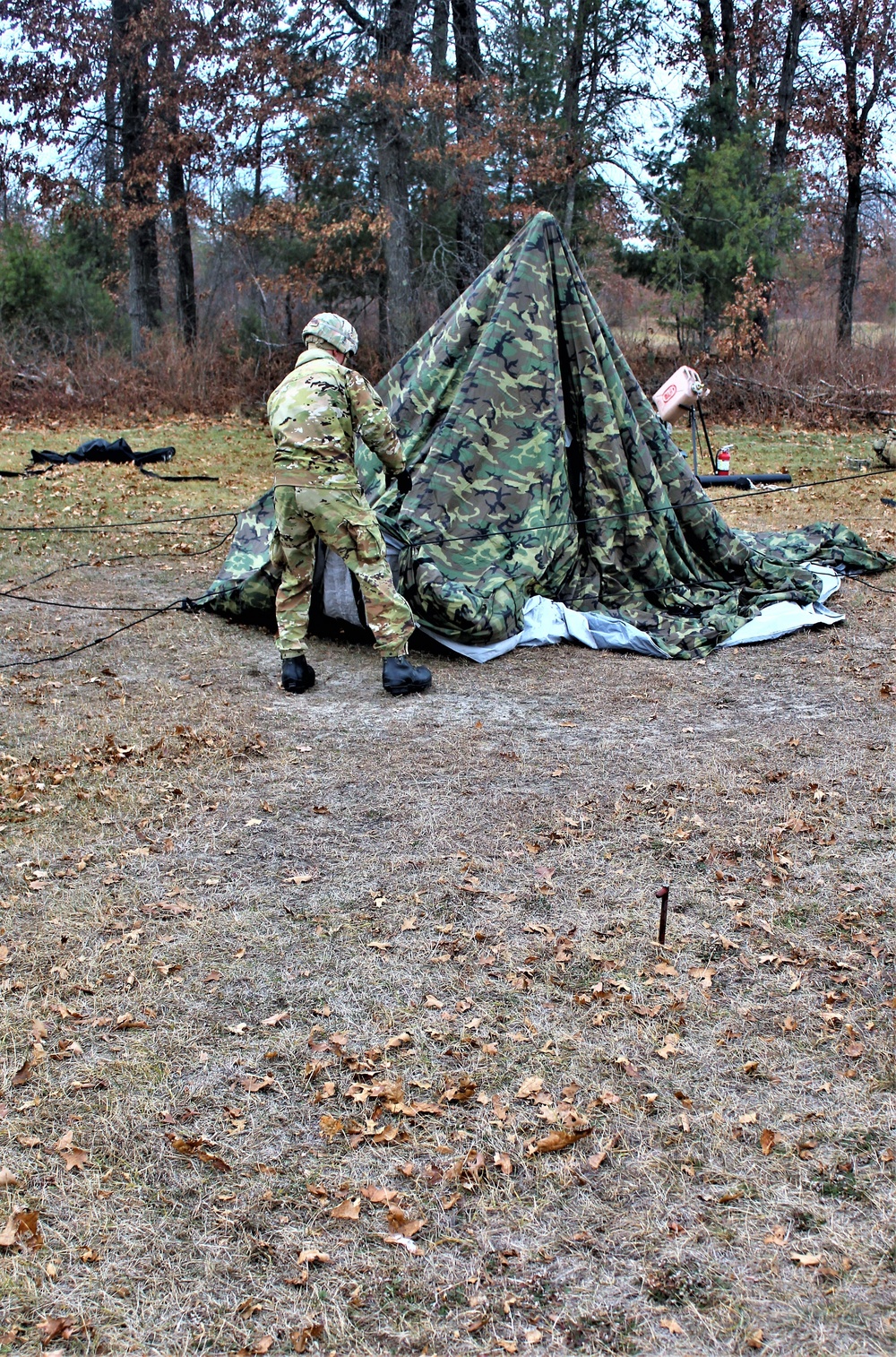 Cold-Weather Operations Course students practice building Arctic tent