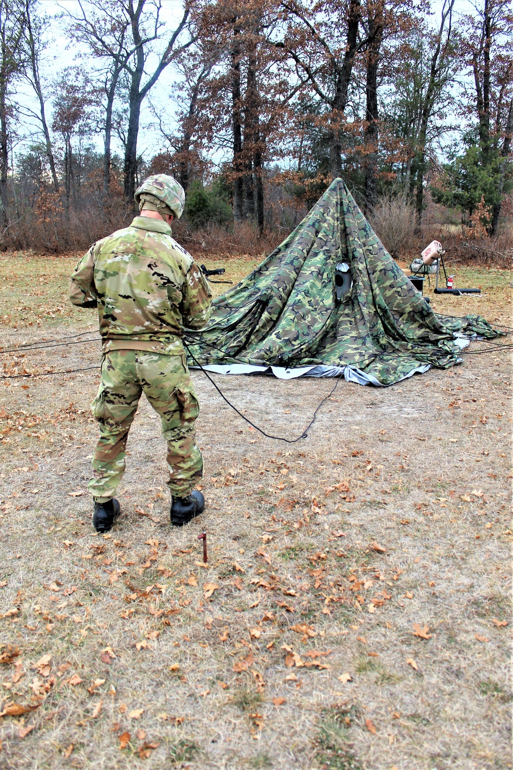 Cold-Weather Operations Course students practice building Arctic tent