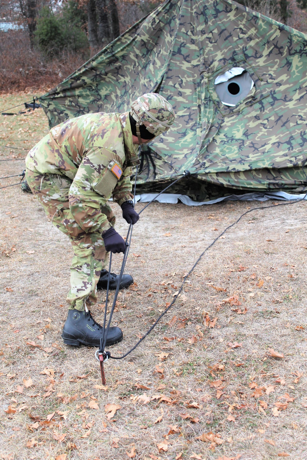 Cold-Weather Operations Course students practice building Arctic tent