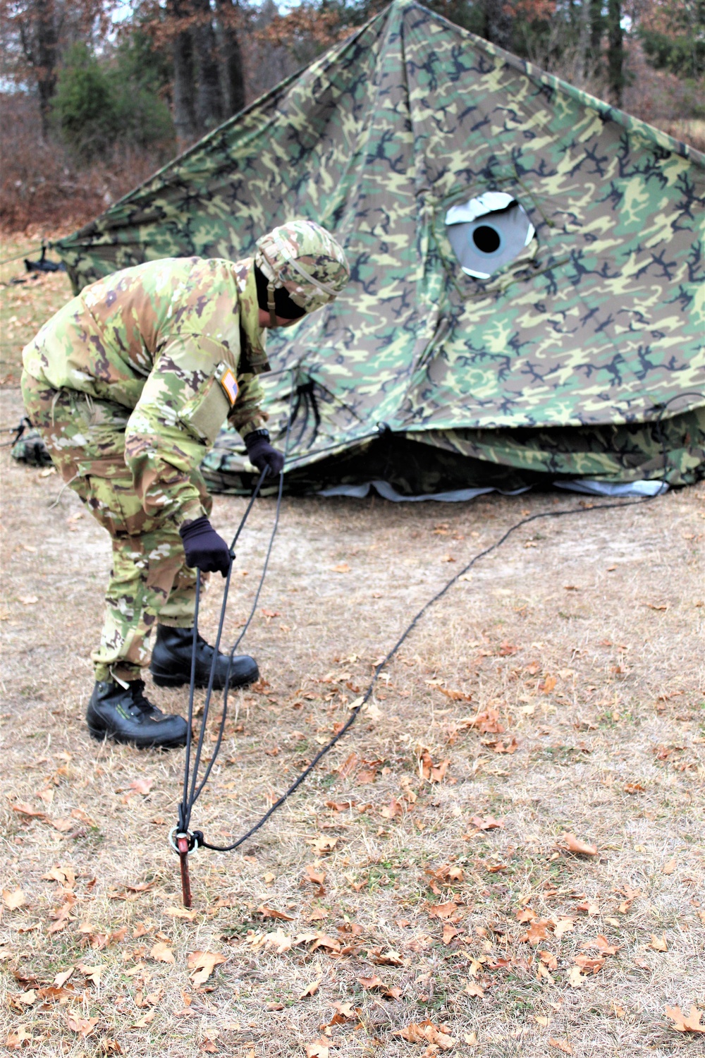 Cold-Weather Operations Course students practice building Arctic tent