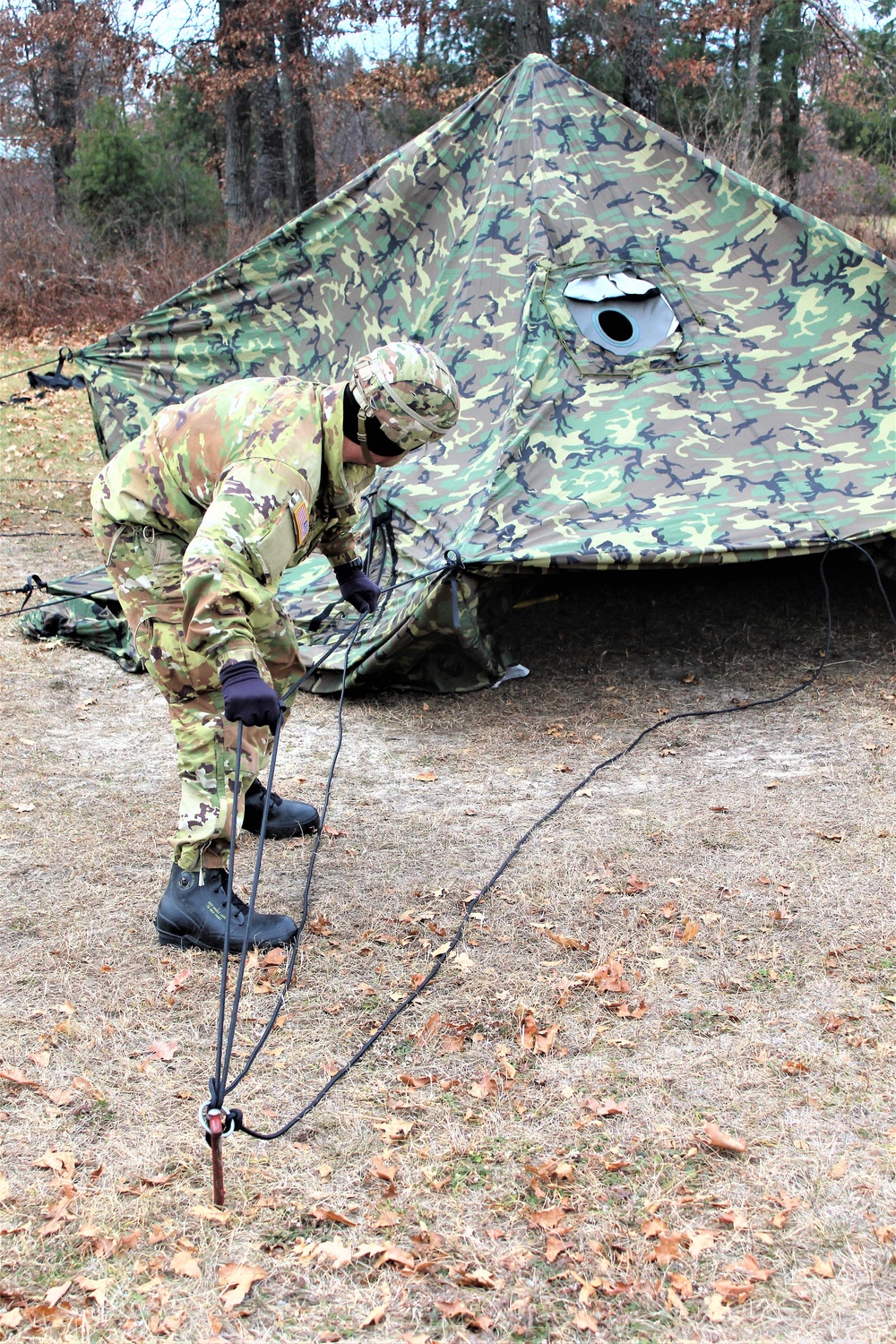 Cold-Weather Operations Course students practice building Arctic tent