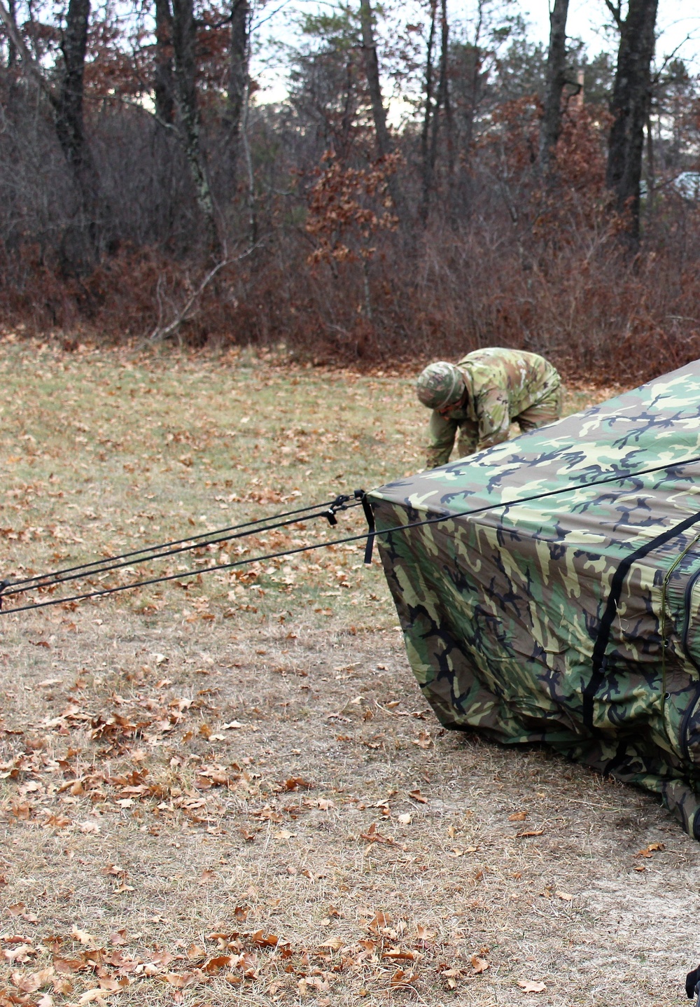 Cold-Weather Operations Course students practice building Arctic tent