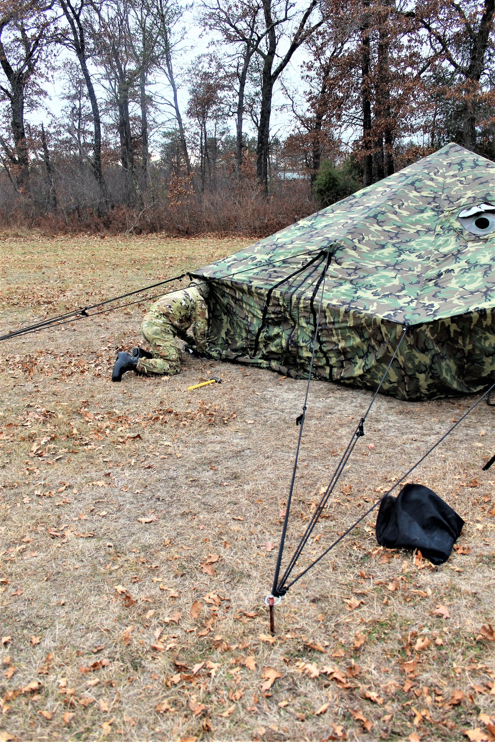 Cold-Weather Operations Course students practice building Arctic tent