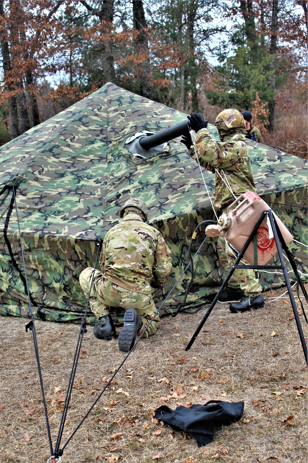 Cold-Weather Operations Course students practice building Arctic tent