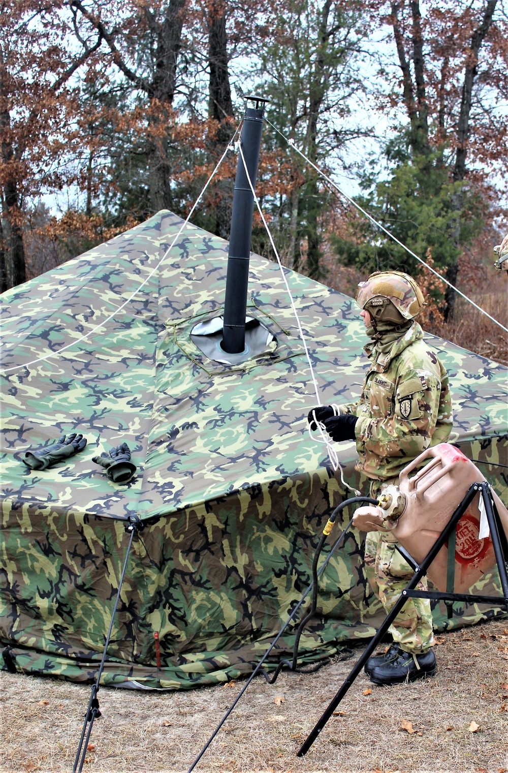 Cold-Weather Operations Course students practice building Arctic tent