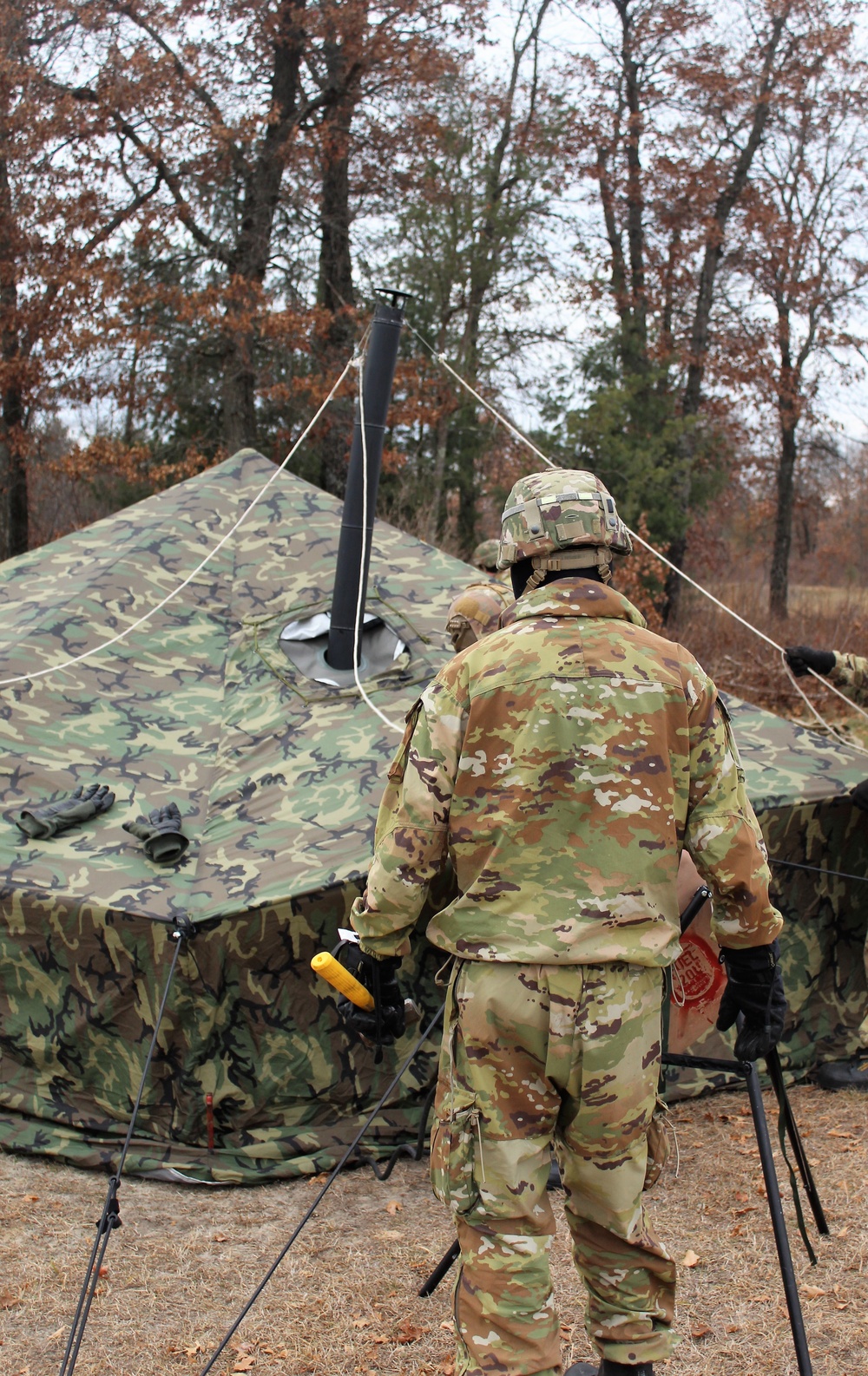 Cold-Weather Operations Course students practice building Arctic tent