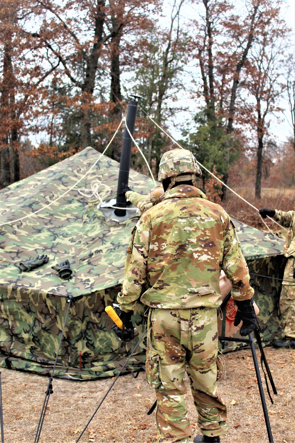 Cold-Weather Operations Course students practice building Arctic tent