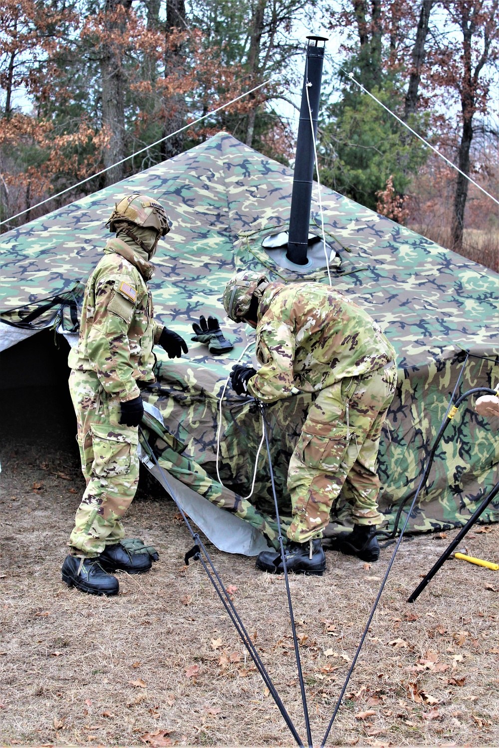 Cold-Weather Operations Course students practice building Arctic tent