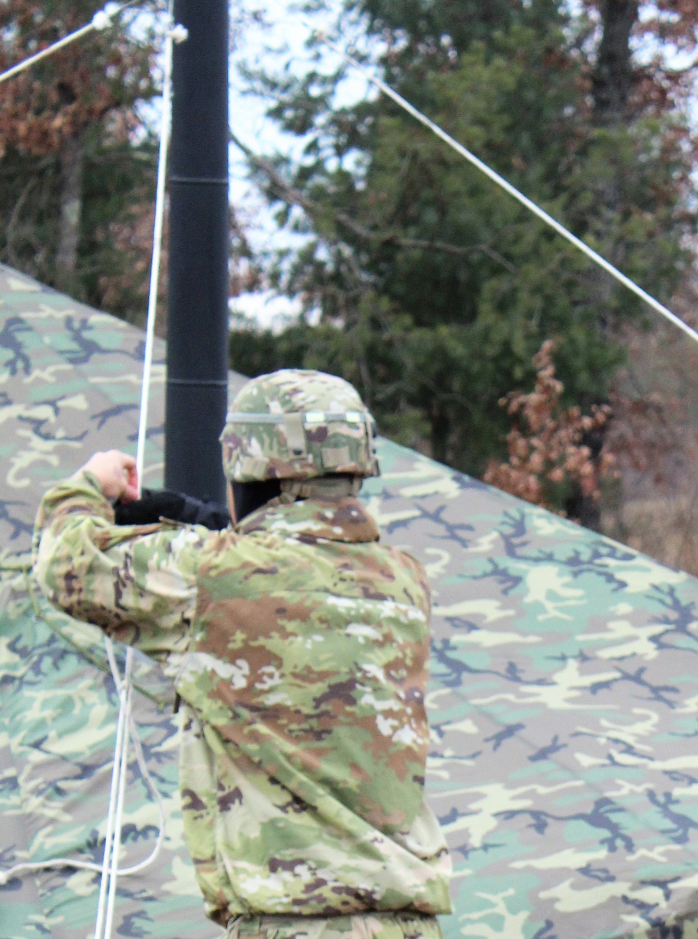 Cold-Weather Operations Course students practice building Arctic tent