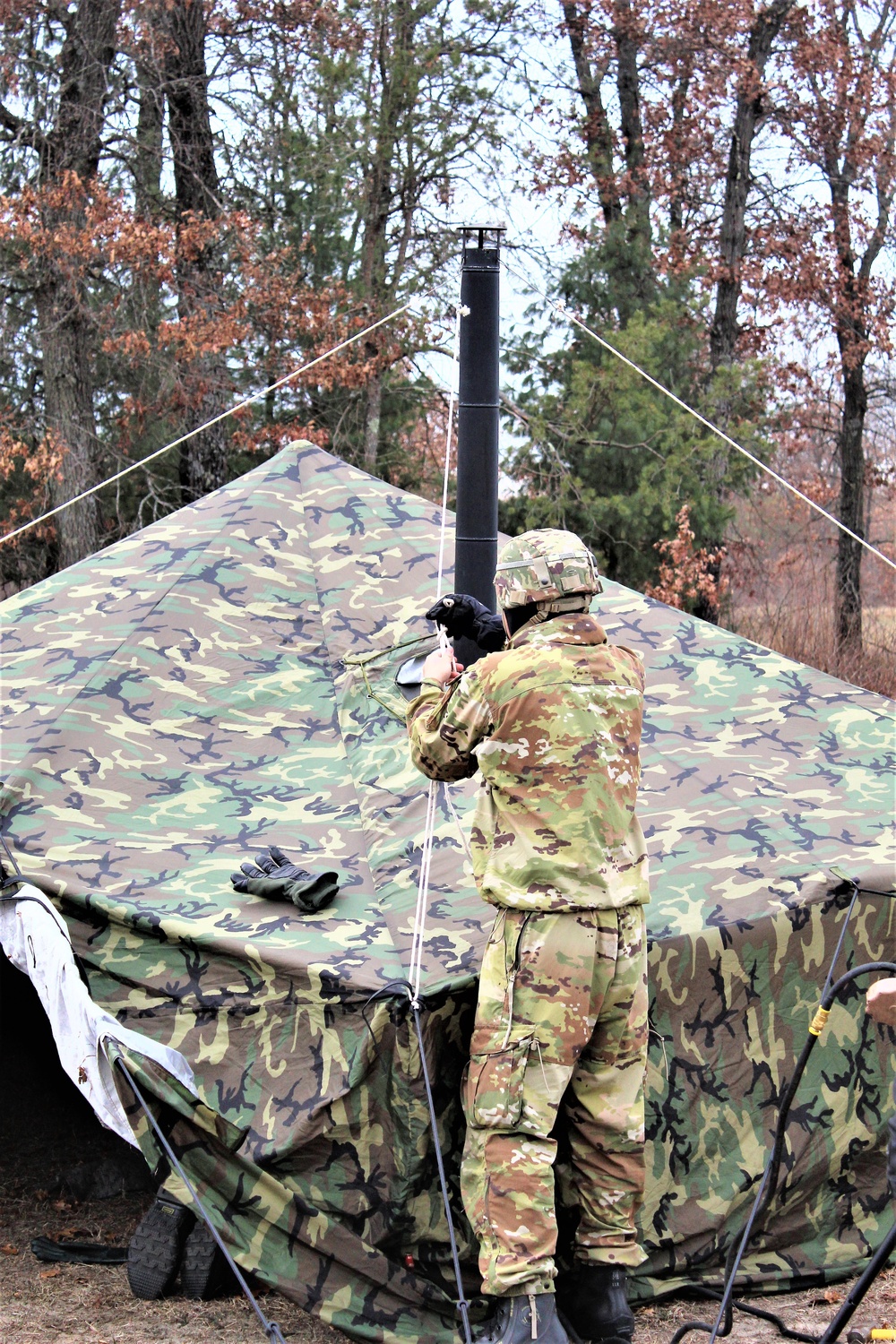 Cold-Weather Operations Course students practice building Arctic tent