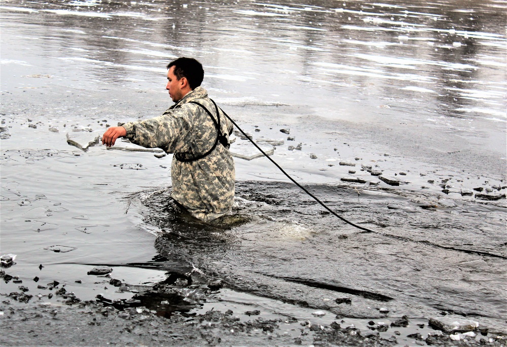 Soldiers participate in cold-water immersion event during CWOC training at Fort McCoy