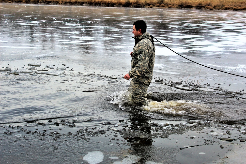 Soldiers participate in cold-water immersion event during CWOC training at Fort McCoy