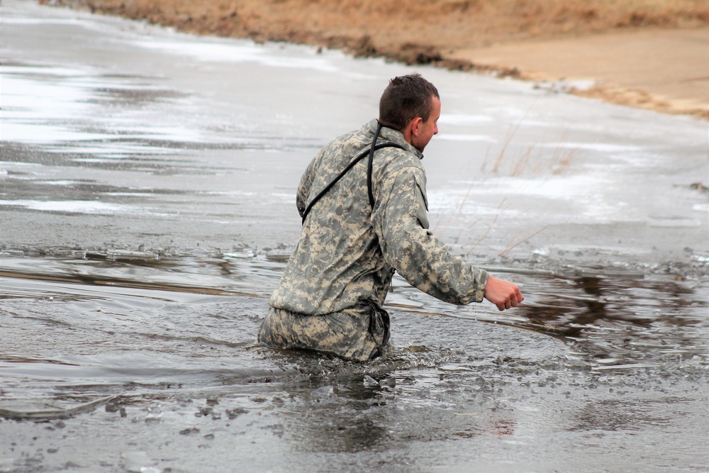 Soldiers participate in cold-water immersion event during CWOC training at Fort McCoy