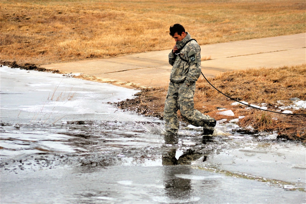 Soldiers participate in cold-water immersion event during CWOC training at Fort McCoy