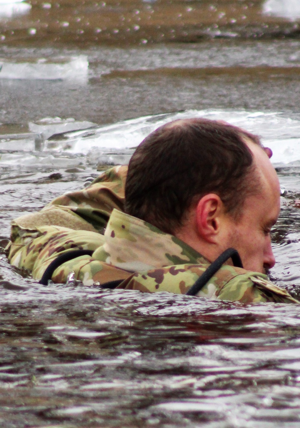 Soldiers participate in cold-water immersion event during CWOC training at Fort McCoy