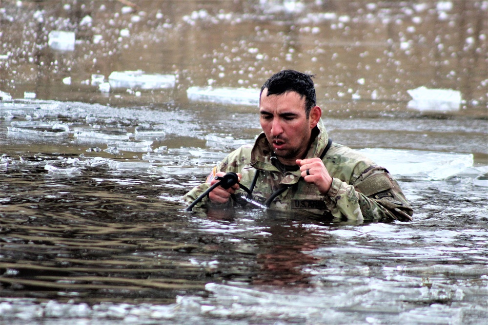 Soldiers participate in cold-water immersion event during CWOC training at Fort McCoy