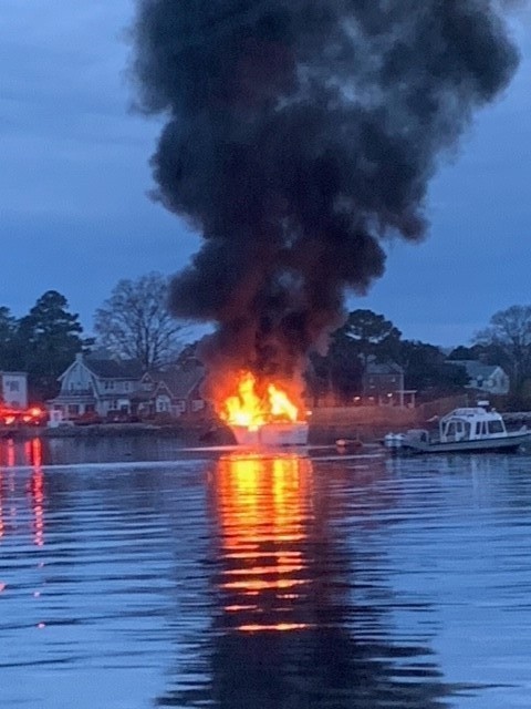 Coast Guard, Navy, and local municipalities coordinate to save man from burning vessel