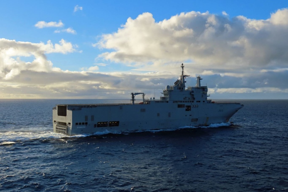French Navy LHD Dixmude sails off after completing replenishment-at-sea with U.S. Navy USNS Laramie