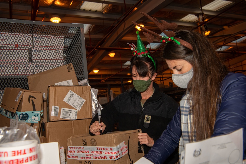 NAVSTA Rota Post Office Sorts Holiday Mail