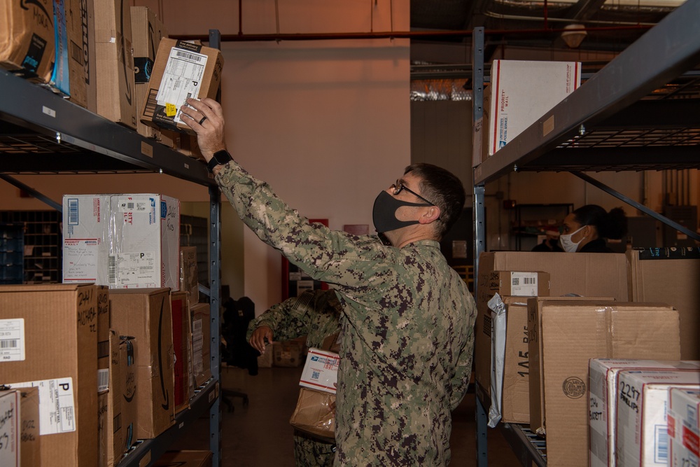 NAVSTA Rota Post Office Sorts Holiday Mail