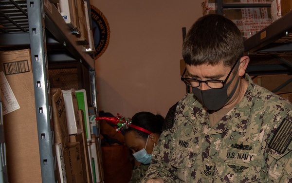 NAVSTA Rota Post Office Sorts Holiday Mail