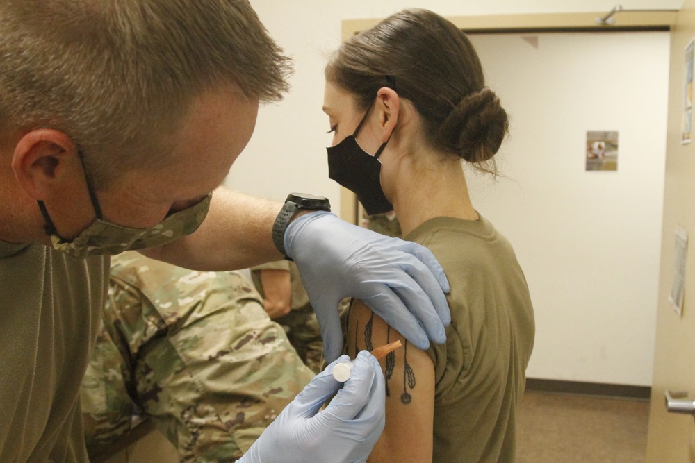 Arizona National Guard Spc. Brenna Rath is the first enlisted service member to receive the Moderna vaccine in the state of Arizona
