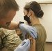 Arizona National Guard Spc. Brenna Rath is the first enlisted service member to receive the Moderna vaccine in the state of Arizona