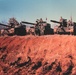 Three tanks in a line guarding red clay hill at JRTC in the late 1980's at JRTC