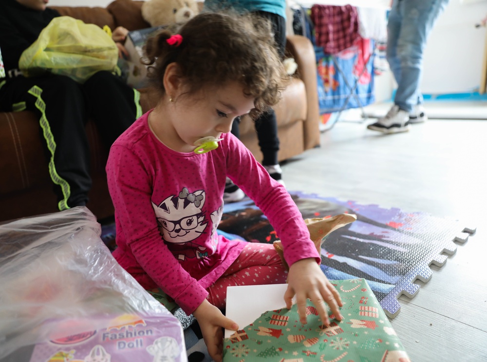U.S. Army Civil Affairs Delivers Christmas Gifts, Good Cheer in Bucharest