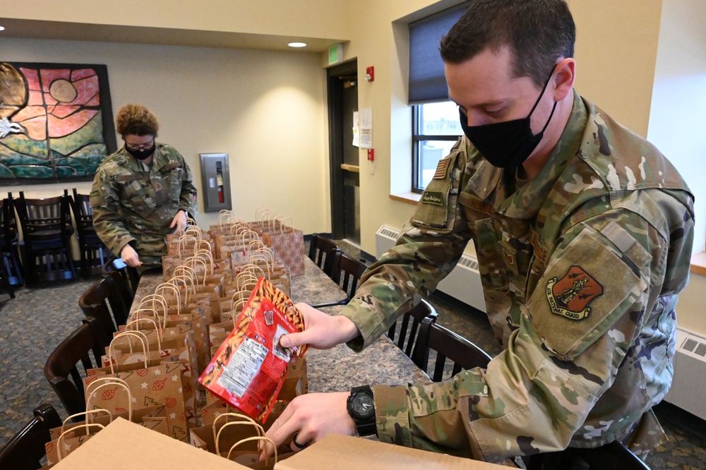 North Dakota National Guard Members Deliver Gifts to ND Veterans Home Residents