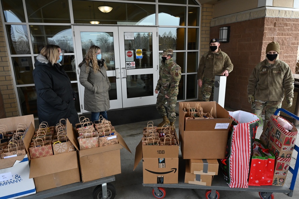 North Dakota National Guard Members Deliver Gifts to ND Veterans Home Residents