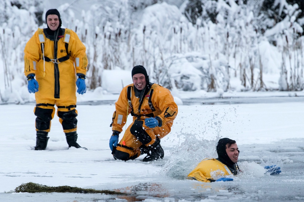 JBER firefighters conduct ice rescue training