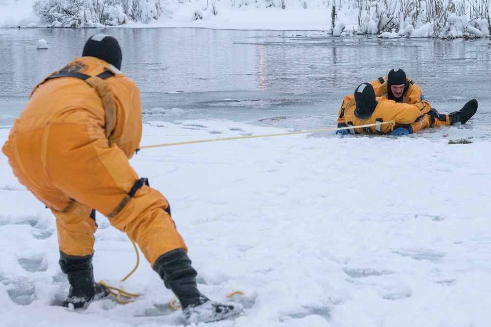 JBER firefighters conduct ice rescue training