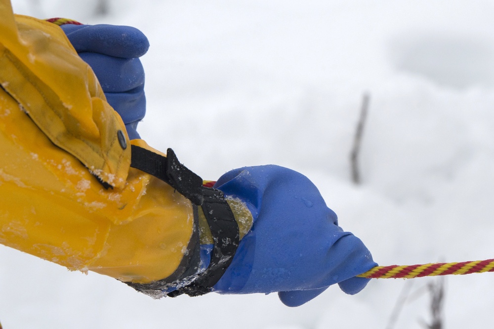 JBER firefighters conduct ice rescue training