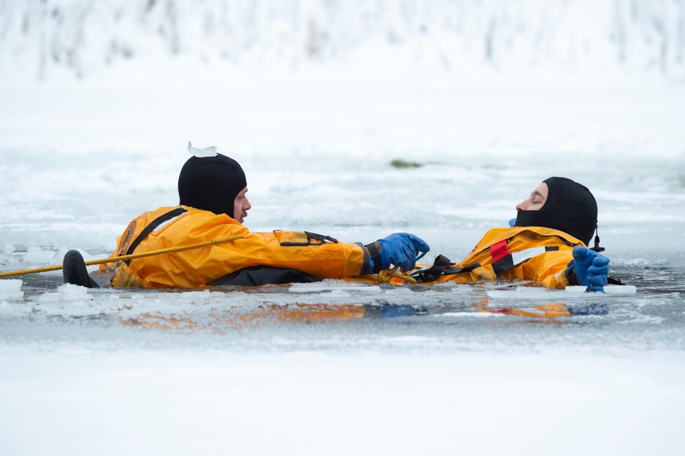 JBER fire protection specialists conduct ice rescue training