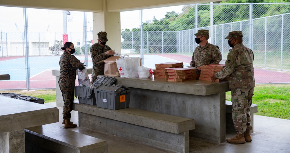 American Red Cross Delivers Care Packages and Pizza to Marines
